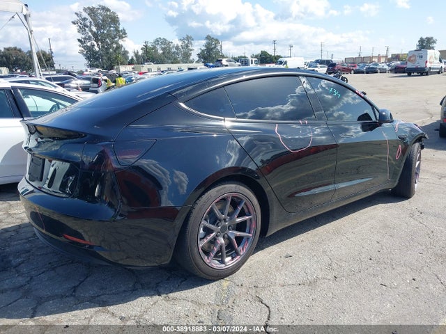 Tesla Model 3 Standard Range Plus Rear-wheel Drive 2021 5YJ3E1EA8MF094352 Image 4