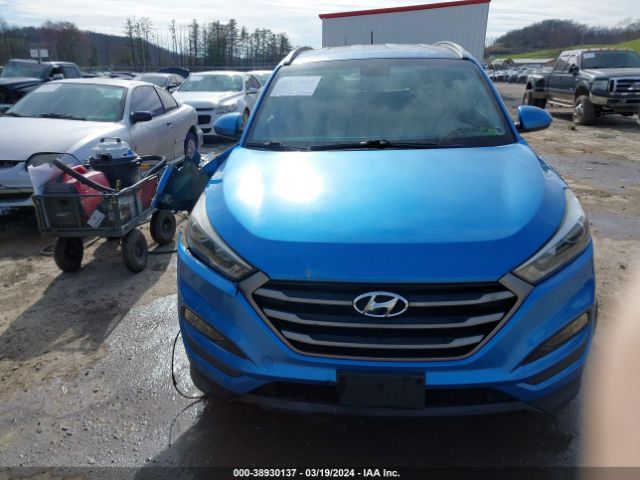 KM8J3CA40GU228321 Hyundai TUCSON SE