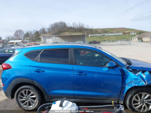 KM8J3CA40GU228321 Hyundai TUCSON SE