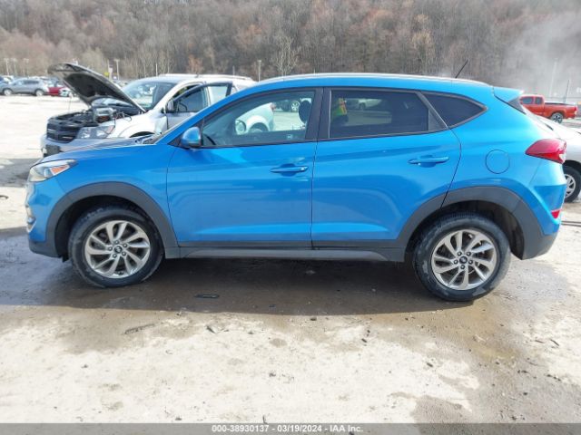 KM8J3CA40GU228321 Hyundai TUCSON SE