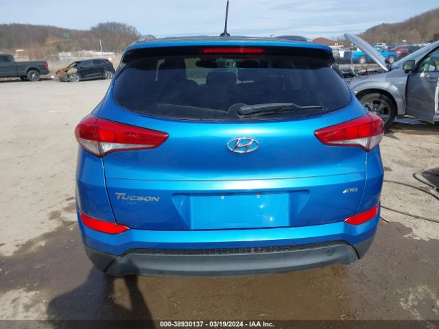 KM8J3CA40GU228321 Hyundai TUCSON SE