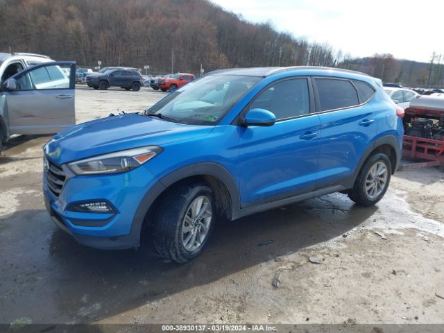 KM8J3CA40GU228321 Hyundai TUCSON SE