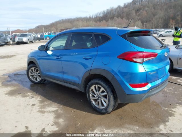 KM8J3CA40GU228321 Hyundai TUCSON SE