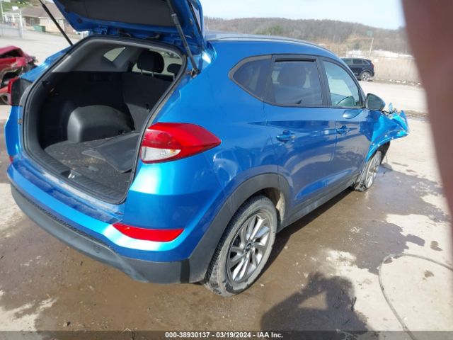 KM8J3CA40GU228321 Hyundai TUCSON SE