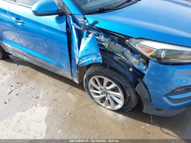 KM8J3CA40GU228321 Hyundai TUCSON SE
