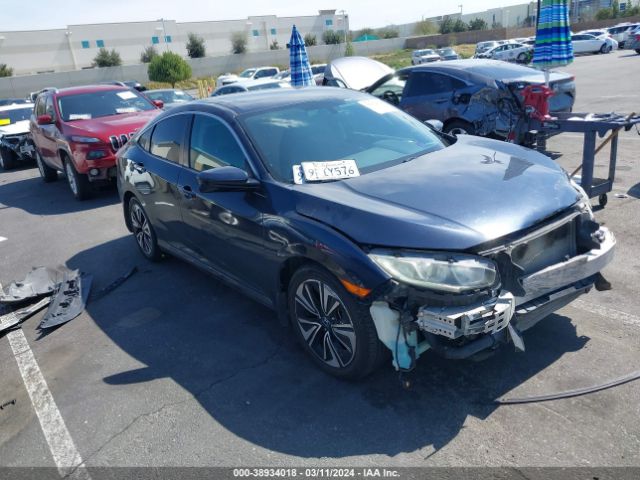 19XFC1F77GE209216 auction archive image