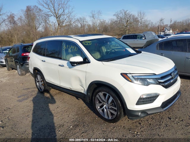Honda Pilot Touring 2017 5FNYF6H9XHB102104 головне зображення
