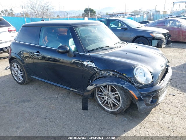 2009 MINI COOPER WMWMF33599TU75034 Photo 0