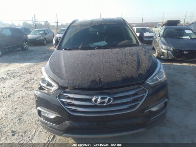 5NMZU3LB9HH030815 Hyundai Santa Fe Sport 2.4l