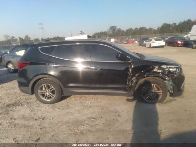 5NMZU3LB9HH030815 Hyundai Santa Fe Sport 2.4l