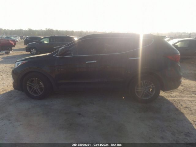 5NMZU3LB9HH030815 Hyundai Santa Fe Sport 2.4l