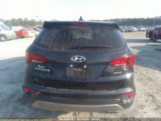 5NMZU3LB9HH030815 Hyundai Santa Fe Sport 2.4l