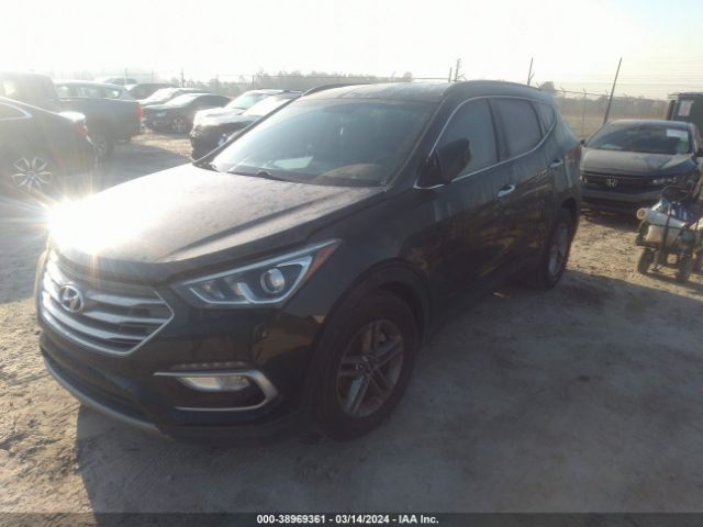 5NMZU3LB9HH030815 Hyundai Santa Fe Sport 2.4l