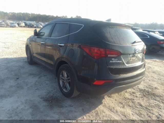 5NMZU3LB9HH030815 Hyundai Santa Fe Sport 2.4l