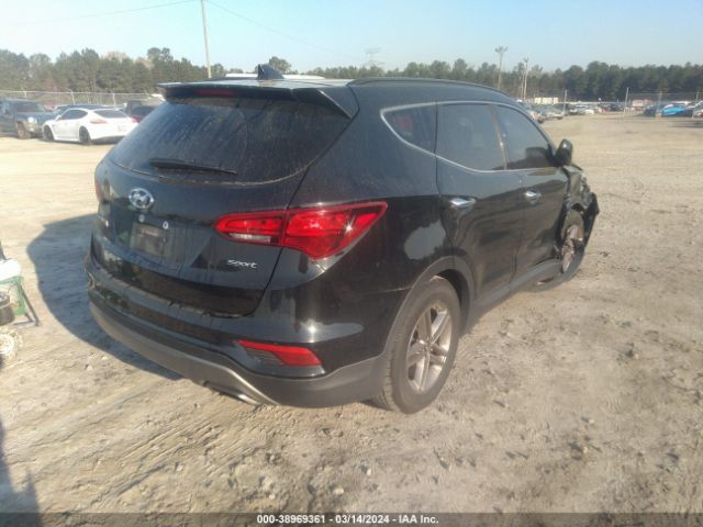 5NMZU3LB9HH030815 Hyundai Santa Fe Sport 2.4l