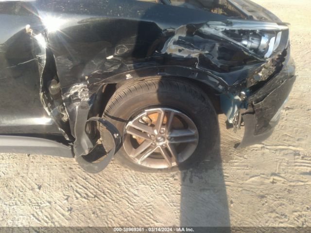 5NMZU3LB9HH030815 Hyundai Santa Fe Sport 2.4l