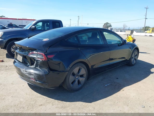 Tesla Model 3 Standard Range Plus Rear-wheel Drive 2021 5YJ3E1EA8MF878076 Image 4