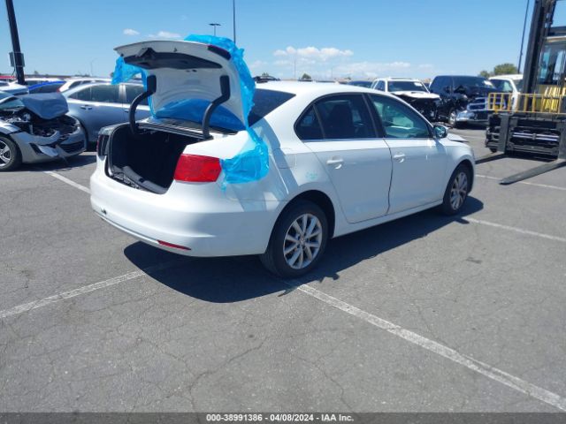 3VWD17AJ3EM306013 Volkswagen Jetta 1.8t Se