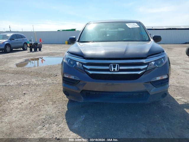 Honda PILOT LX 2018 5FNYF5H19JB028524 Image 6