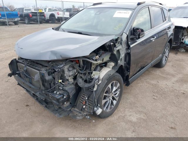 JTMRJREV8GD049933 Toyota Rav4 Hybrid Xle