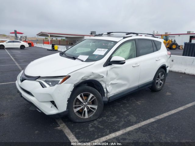 JTMWFREV5GJ070227 Toyota Rav4 Xle