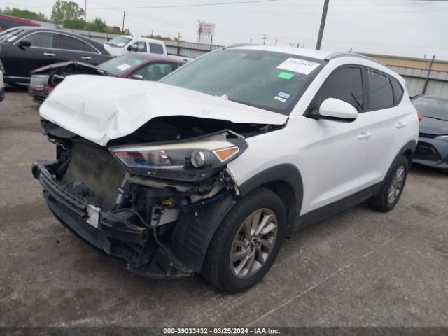KM8J33A44GU148570 Hyundai TUCSON SE