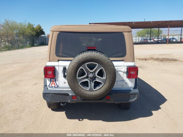 1C4HJXDG3LW144711 Jeep Wrangler Unlimited Black And Tan 4x4