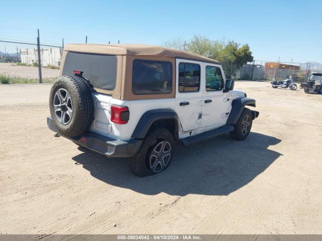 1C4HJXDG3LW144711 Jeep Wrangler Unlimited Black And Tan 4x4