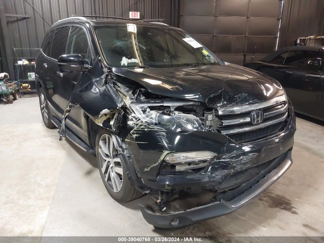 Honda Pilot Touring 2017 5FNYF6H93HB016553 zdjęcie główne