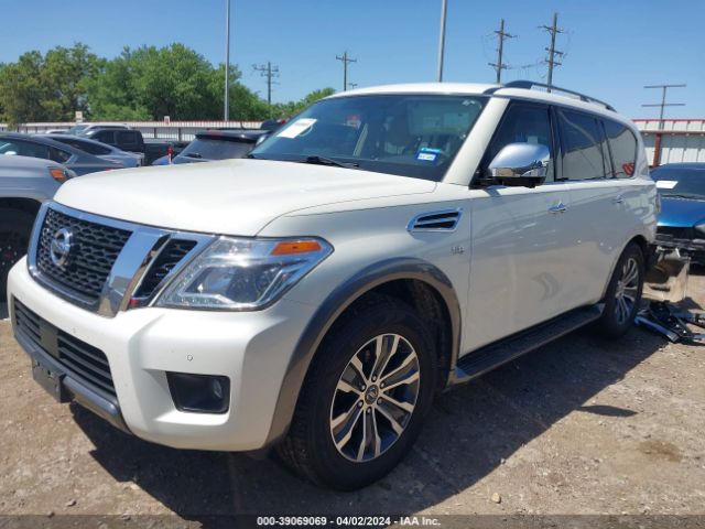 JN8AY2ND4KX009951 Nissan Armada Sl