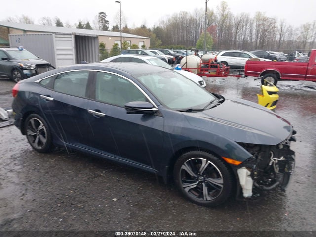 Honda Civic Touring 2017 19XFC1F90HE009958 Image 1