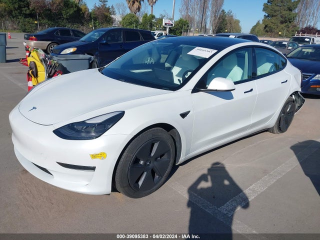Tesla Model 3 Standard Range Plus Rear-wheel Drive 2021 5YJ3E1EA3MF073487 Image 2