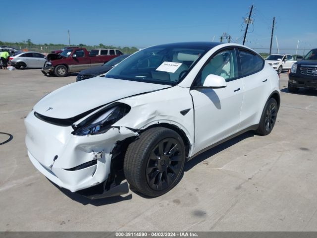 2024 TESLA MODEL Y 7SAYGDEE2RA257735 Photo 1