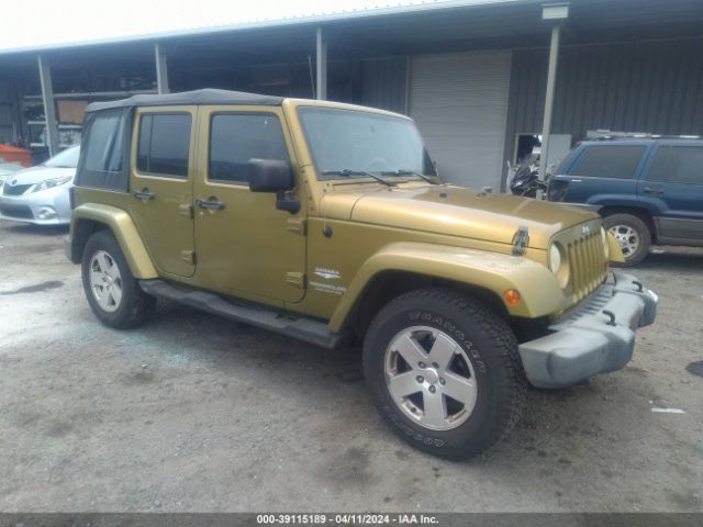 Auction sale of the 2007 Jeep Wrangler Unlimited Sahara, vin: 1J4GB59197L184326, lot number: 39115189