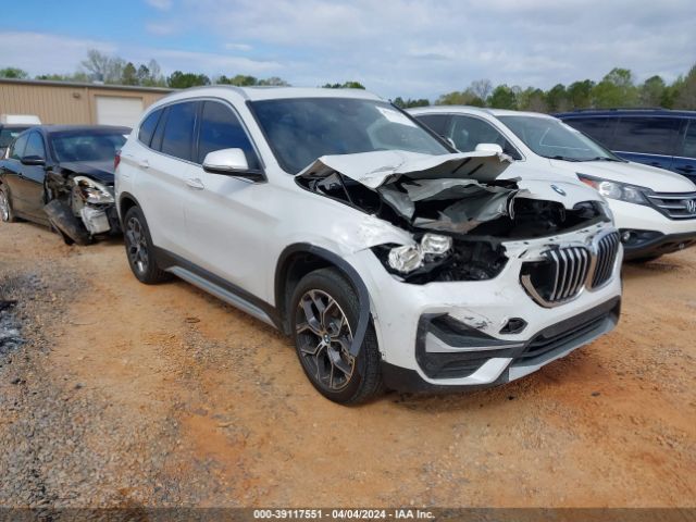 2021 BMW X1 WBXJG7C09M5T58374