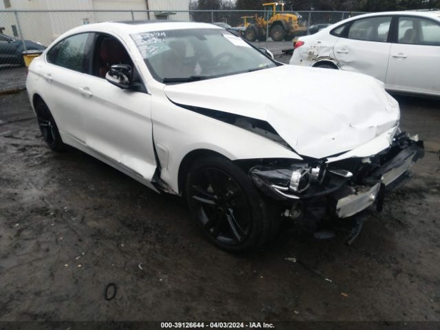 WBA4J5C52KBM66309 auction archive image
