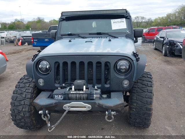 1C4HJWDG5FL563143 Jeep Wrangler Unlimited Freedom Edition