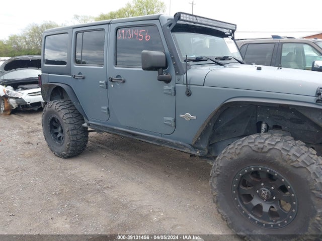 1C4HJWDG5FL563143 Jeep Wrangler Unlimited Freedom Edition