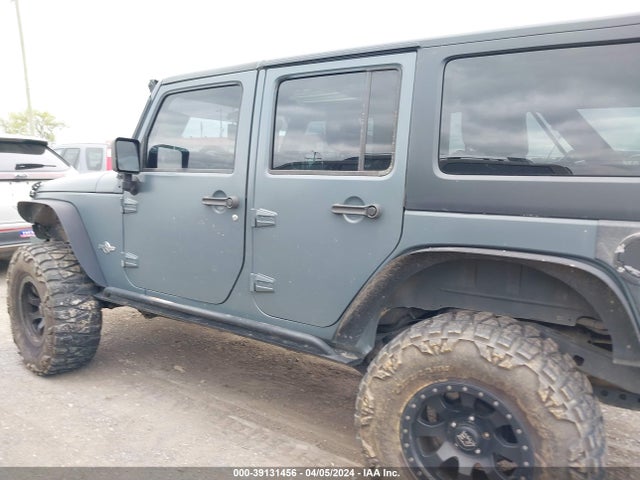 1C4HJWDG5FL563143 Jeep Wrangler Unlimited Freedom Edition