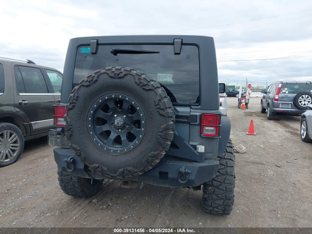 1C4HJWDG5FL563143 Jeep Wrangler Unlimited Freedom Edition