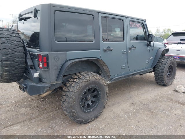 1C4HJWDG5FL563143 Jeep Wrangler Unlimited Freedom Edition