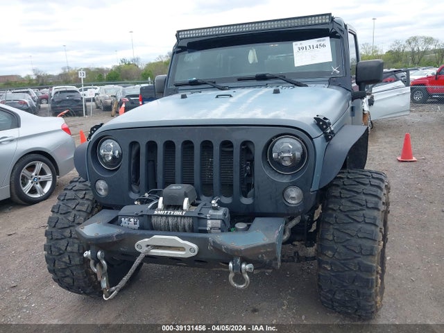 1C4HJWDG5FL563143 Jeep Wrangler Unlimited Freedom Edition