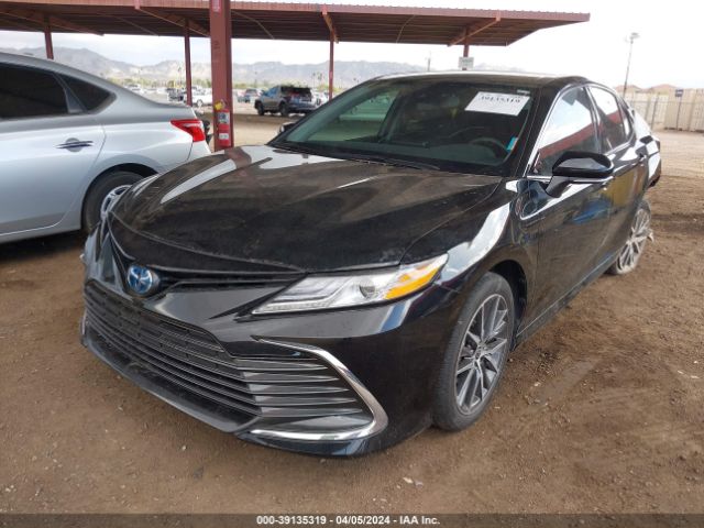 4T1F31AK0NU599100 Toyota Camry Xle Hybrid