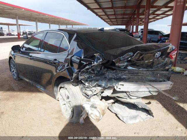 4T1F31AK0NU599100 Toyota Camry Xle Hybrid