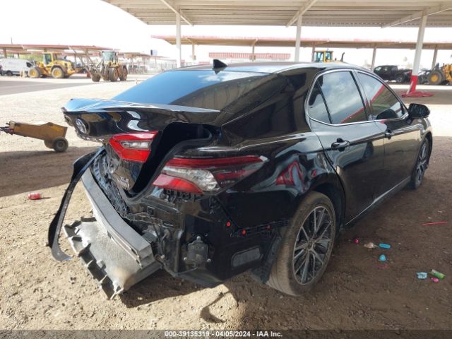 4T1F31AK0NU599100 Toyota Camry Xle Hybrid