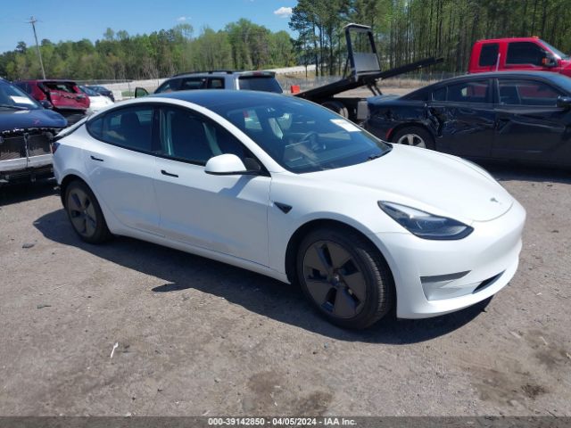 2021 Tesla Model 3 Standard Range Plus Rear-wheel Drive მანქანა იყიდება აუქციონზე, vin: 5YJ3E1EA8MF919774, აუქციონის ნომერი: 39142850