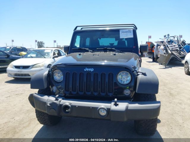 1C4AJWAG4EL157309 Jeep Wrangler Sport