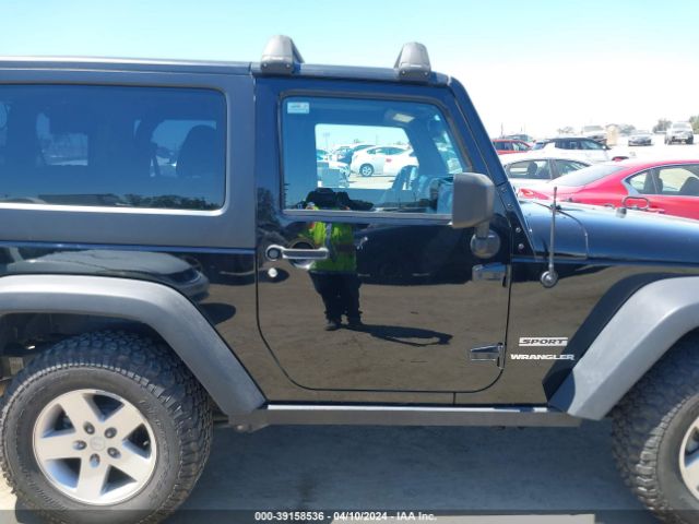 1C4AJWAG4EL157309 Jeep Wrangler Sport