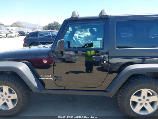 1C4AJWAG4EL157309 Jeep Wrangler Sport