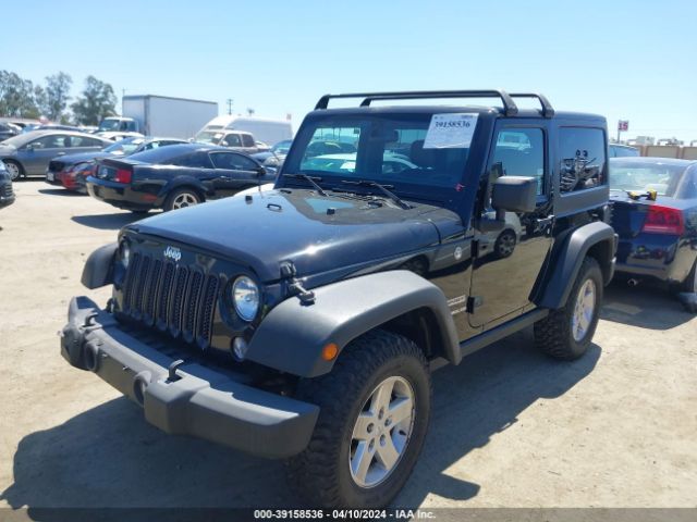 1C4AJWAG4EL157309 Jeep Wrangler Sport